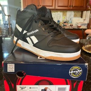 Heelys - black high top sneakers. Size 6